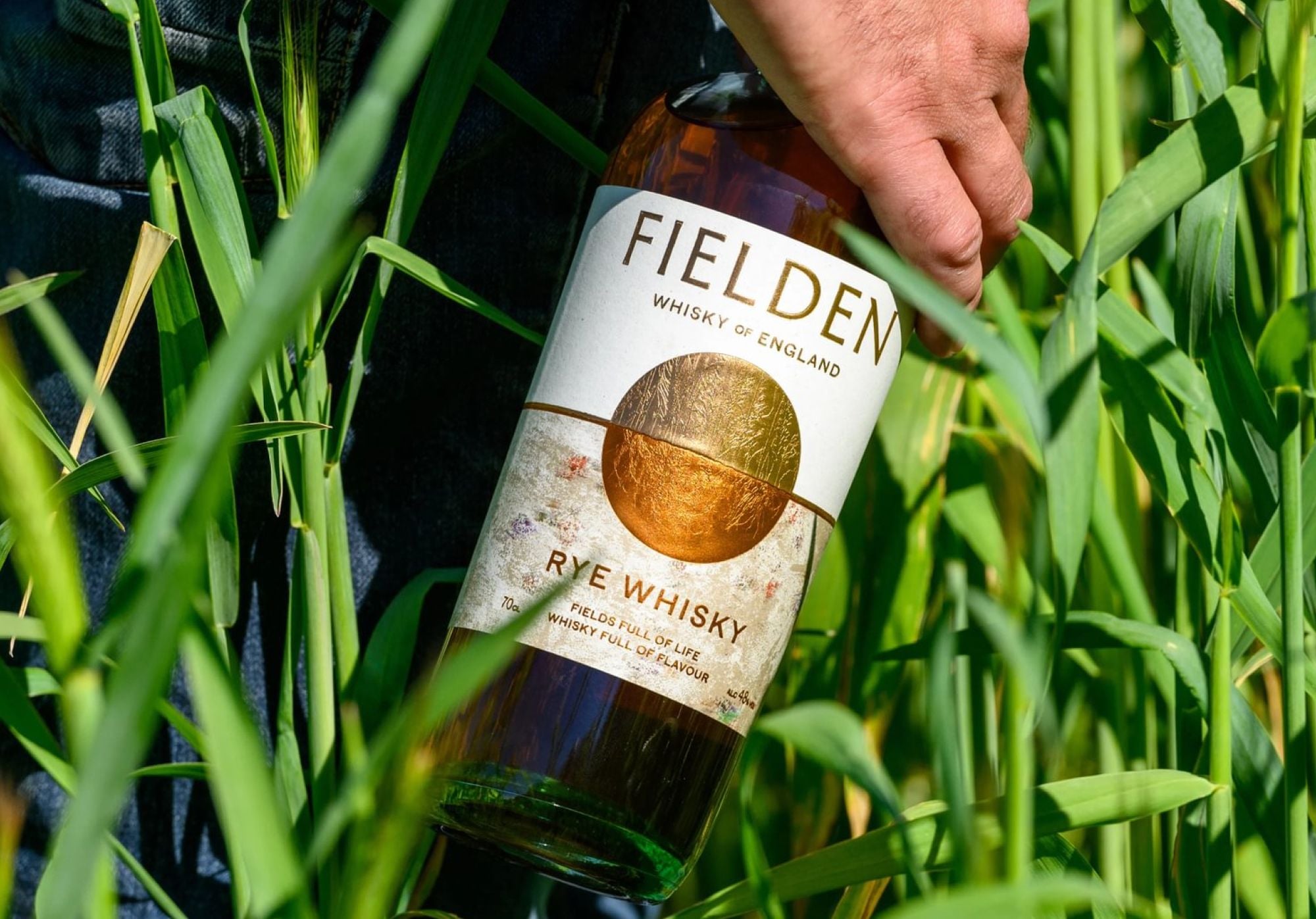 Fielden whisky surrounded by grain