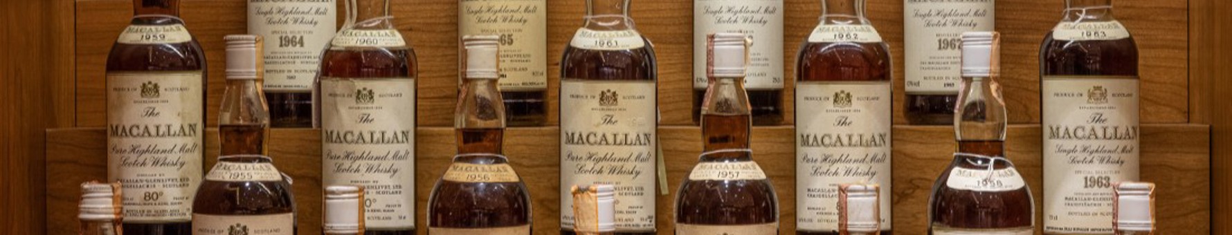 Vintage Macallan single malts in a custom built cabinet