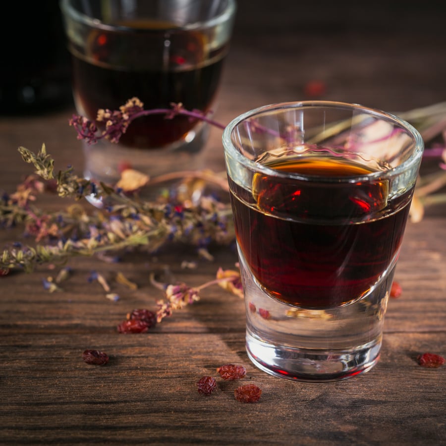 A glass of herbal liqueur
